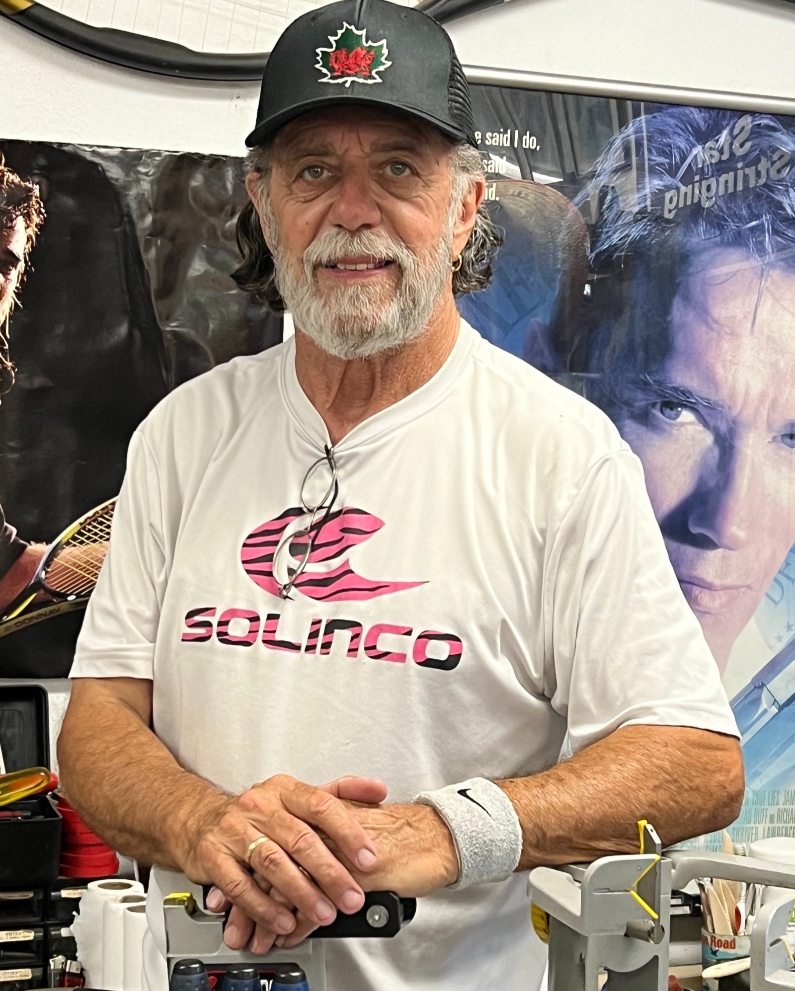 David Mindell, CC Tennis Club's stringing expert, on court
