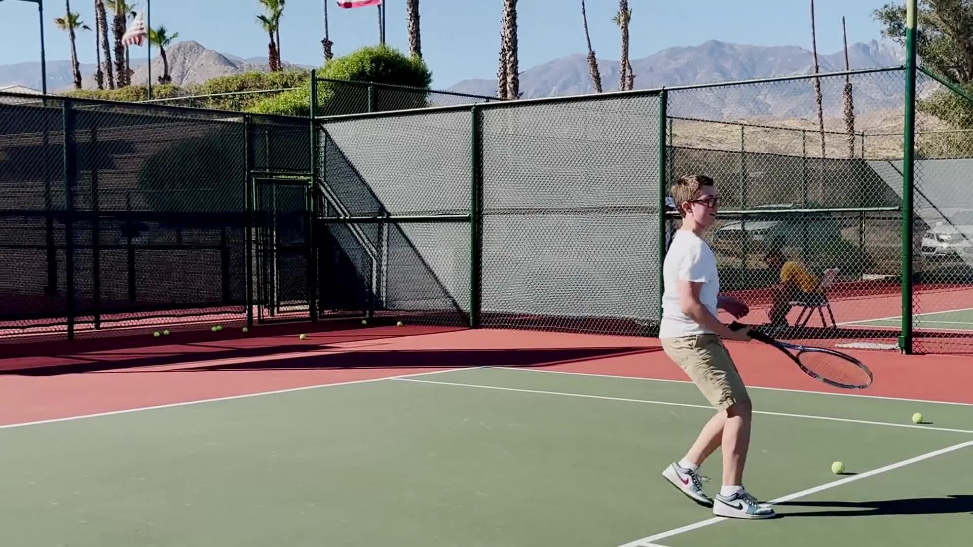 Junior Coaching — young player on court, video thumbnail